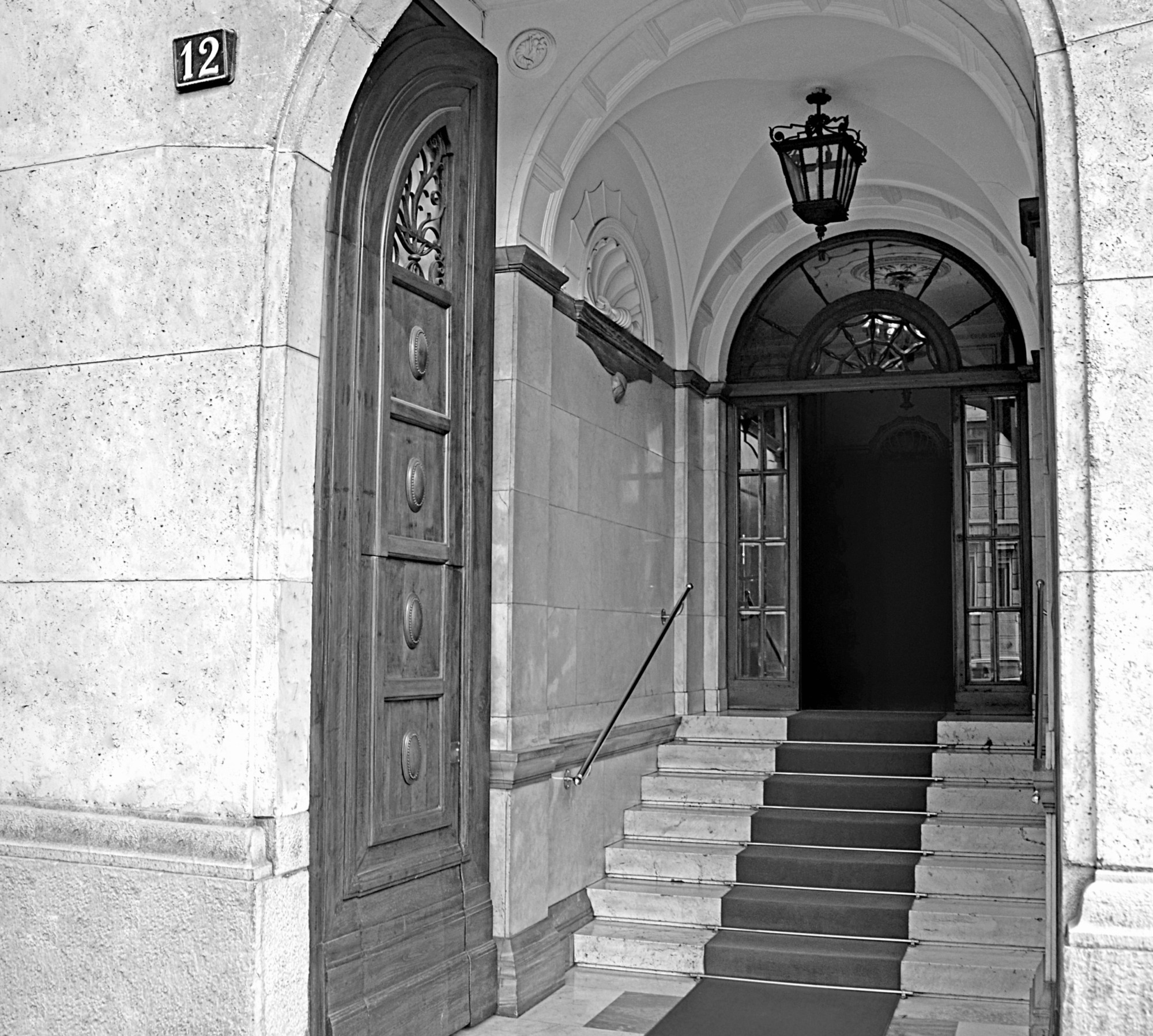 Historic building entrance at number 12, housing the Milan staffing agency headquarters
